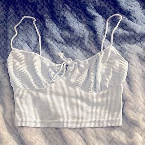 The color is baby blue , it’s originally a small but fits like a medium.